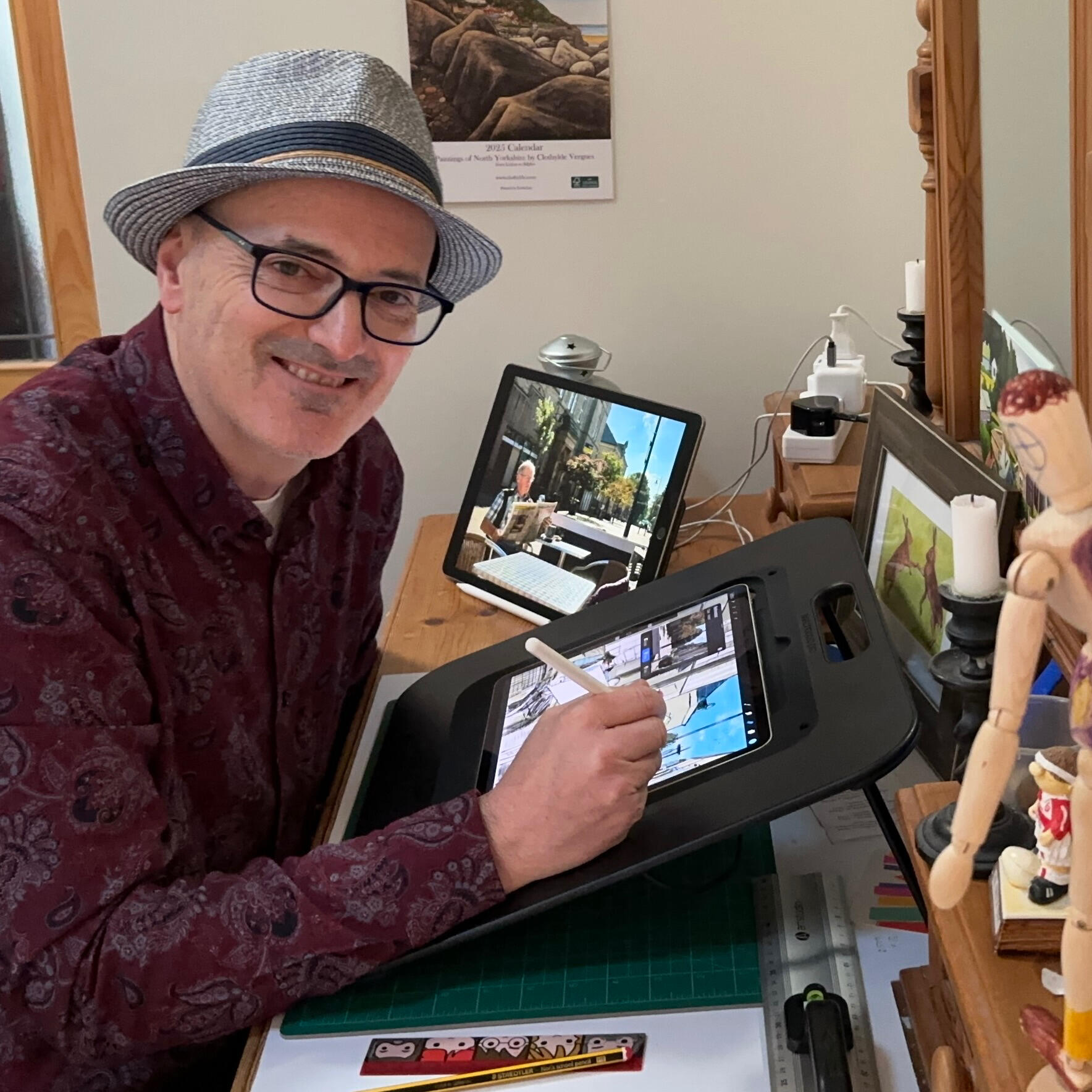 Painting in the studio Artist Daragh Corcoran painting on iPad - Yorkshire Art